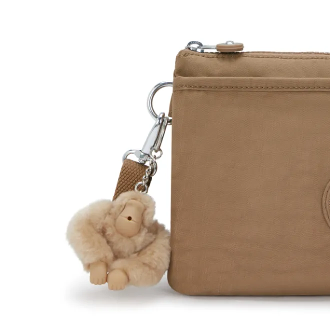 Hot Kipling Riri b early tan